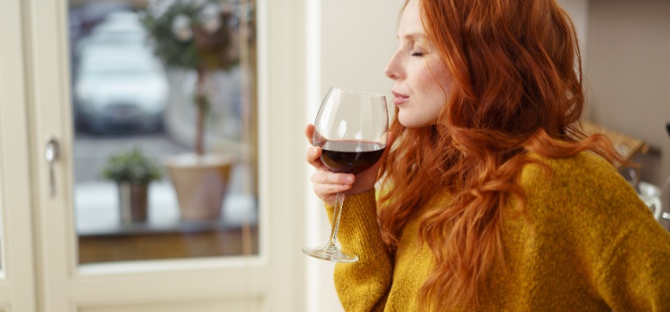 Woman enjoying a glass of wine